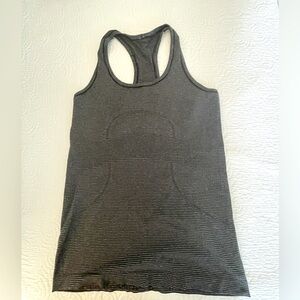 Swiftly Tech Racerback Tank Top Hip Length.